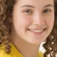 a girl in yellow